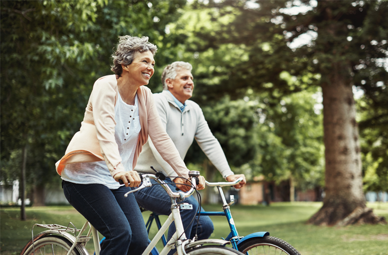Couple enjoying bike ride with a feeling of independence